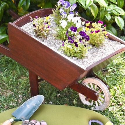 Crushed Sea Shells 2kg wheelbarrow in garden - Grit & Grow